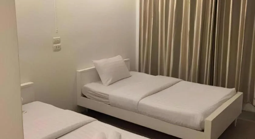 Bed in Chiang Rai Hotel
