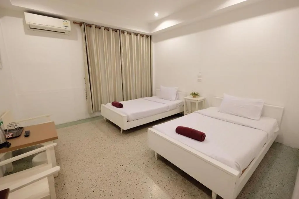 Bed in Chiang Rai Hotel