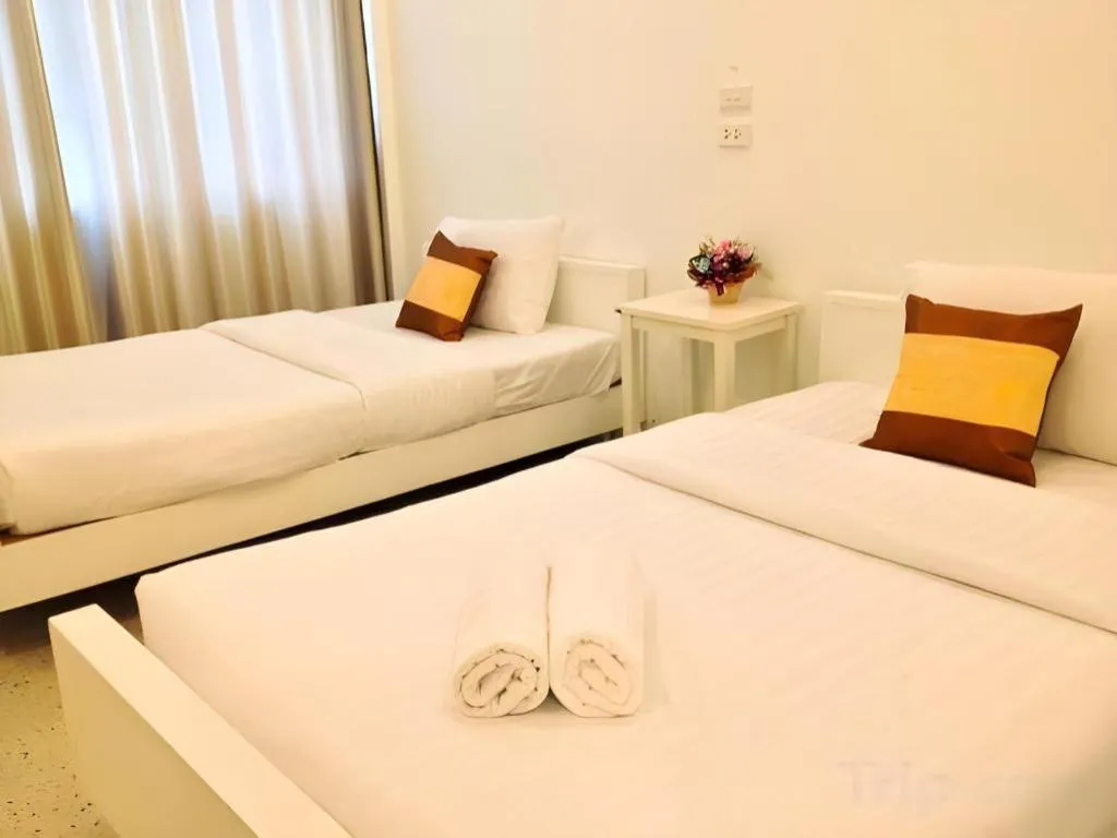 Bed in Chiang Rai Hotel