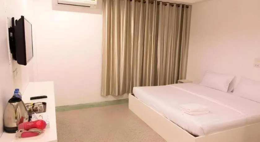 Bed in Chiang Rai Hotel