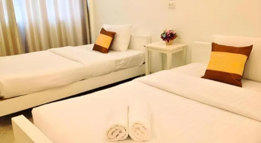 Bed in Chiang Rai Hotel