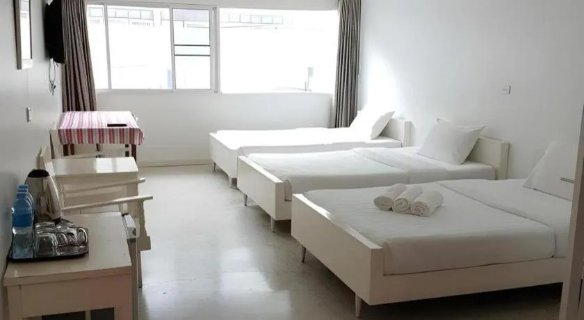 Bed in Chiang Rai Hotel