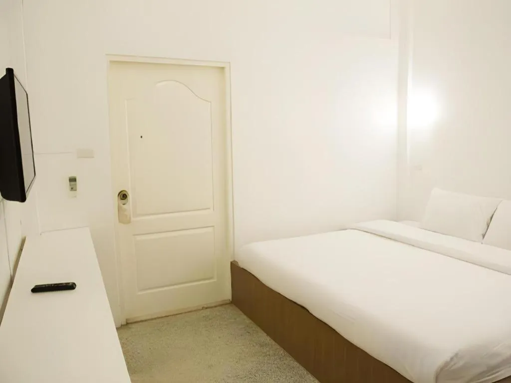 Bed in Chiang Rai Hotel