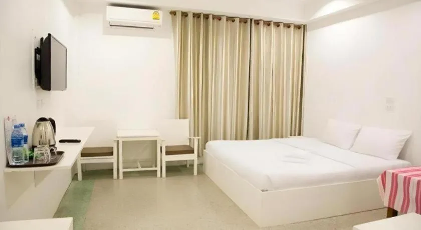 Bed in Chiang Rai Hotel