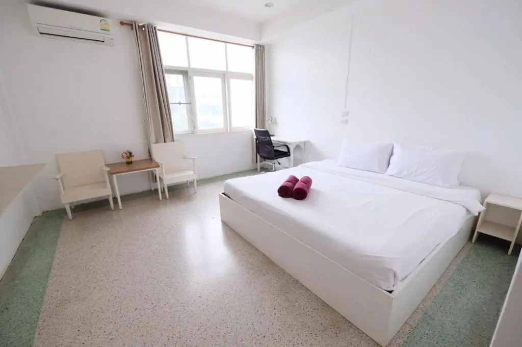 Bed in Chiang Rai Hotel