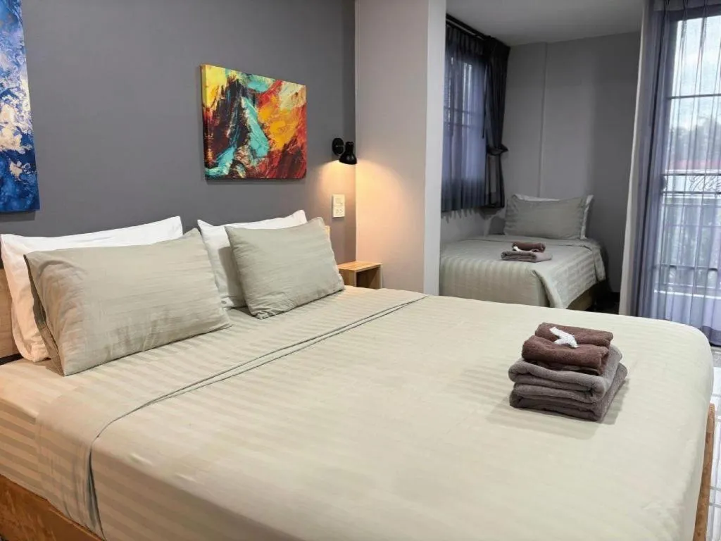 Bed in The Hub Hotel Surin