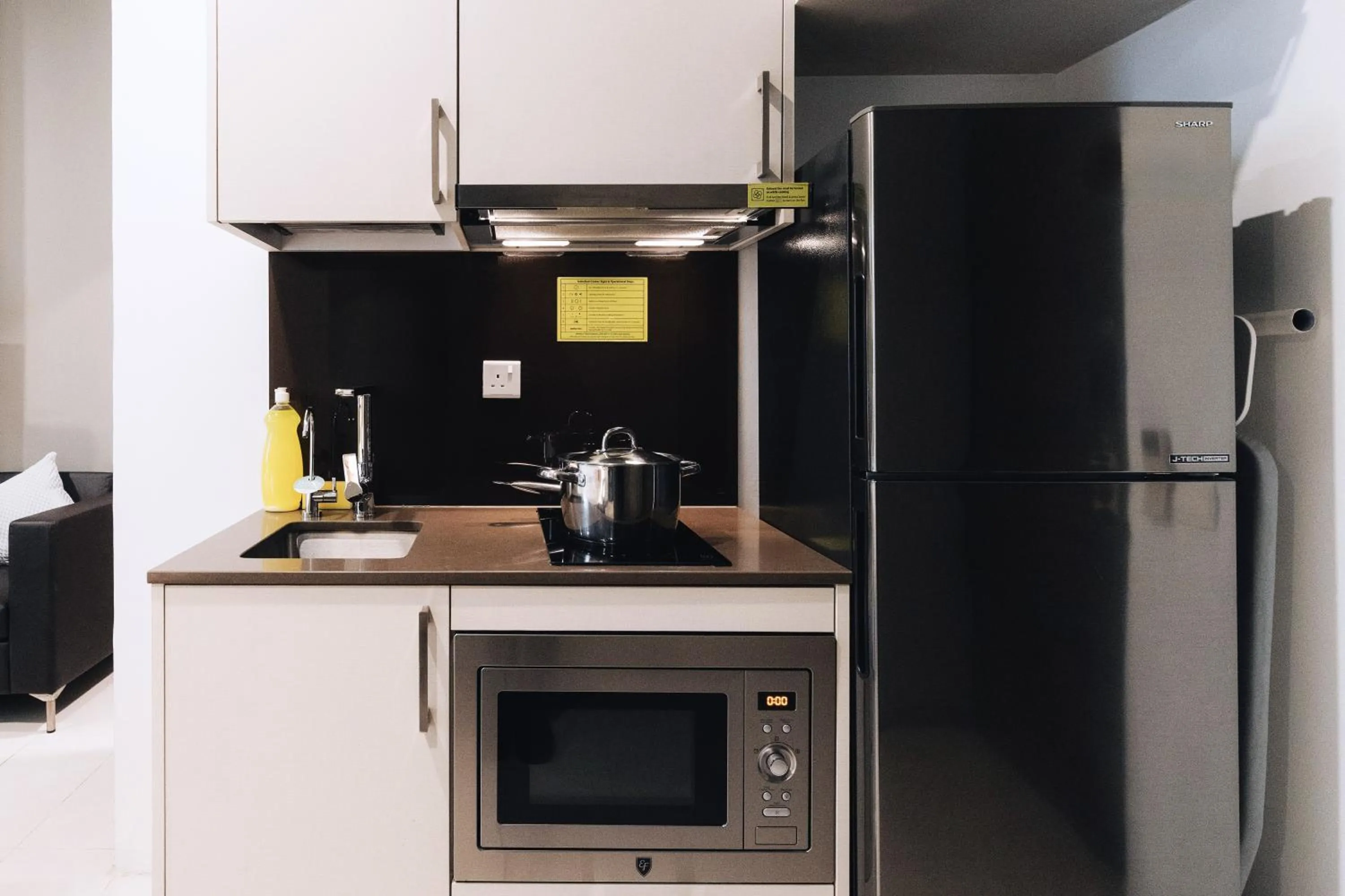 Kitchen or kitchenette in Louis Kienne Serviced Residences - Havelock