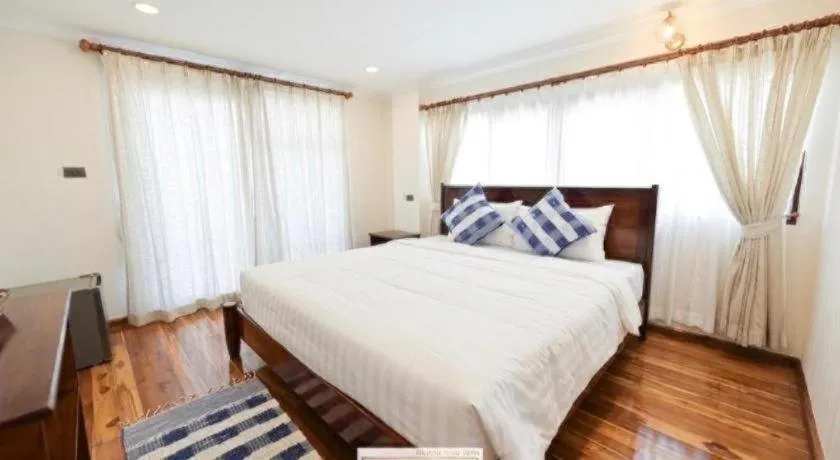 Bed in Chiangkhan Town Hotel