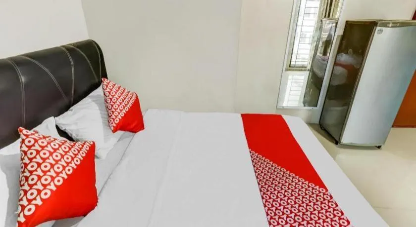 Bed in OYO 91296 Nagoya Guesthouse