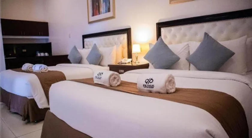 Bed in Primus Hotel and Resort