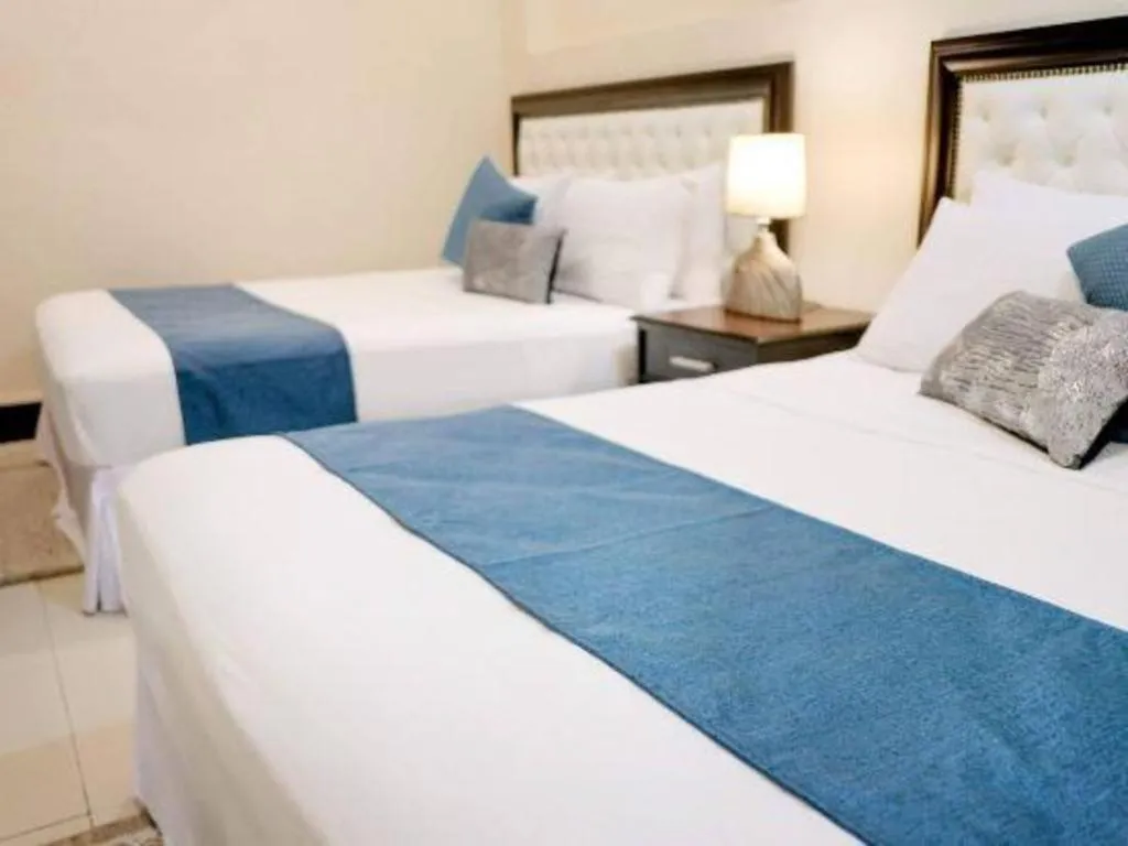 Bed in Primus Hotel and Resort