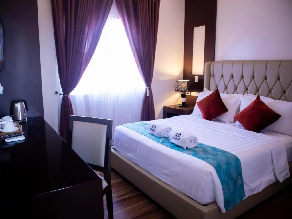 Bed in Primus Hotel and Resort