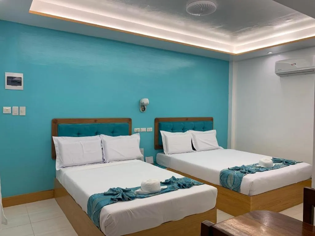 Bed in Alona Mariners Resort