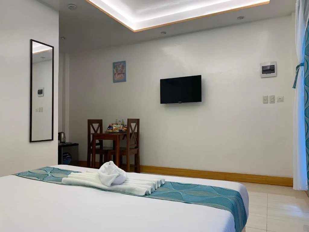 Bed in Alona Mariners Resort