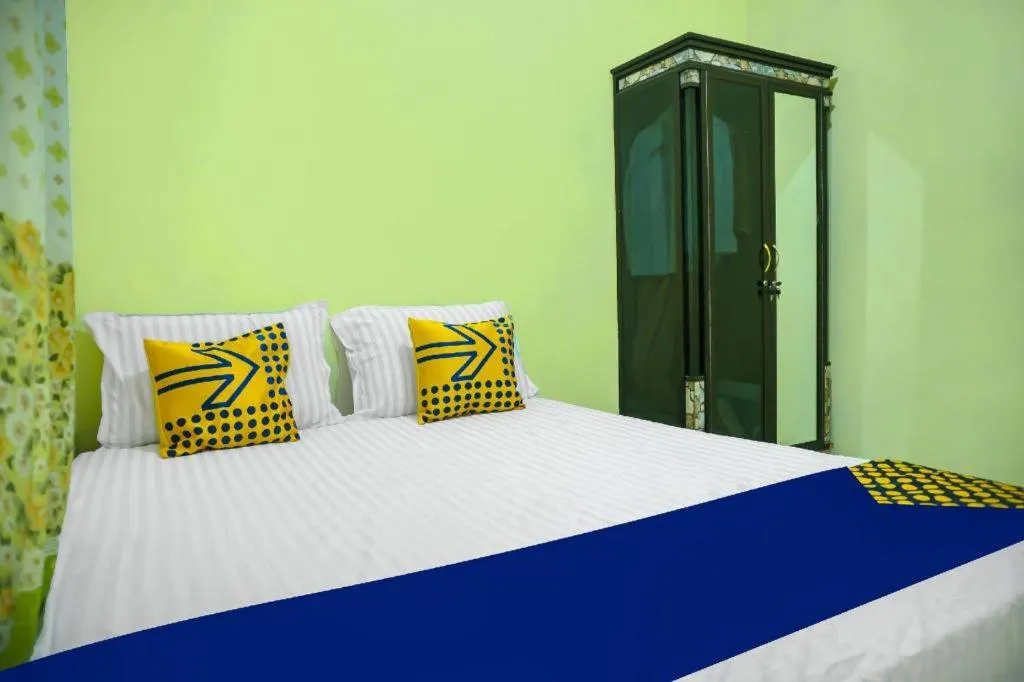 Bed in Hotel O Kost Qiu Qiu 99