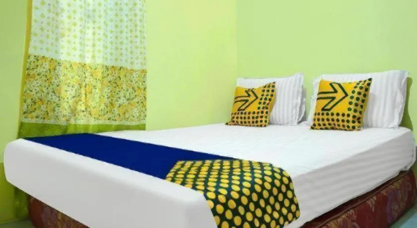 Bed in Hotel O Kost Qiu Qiu 99