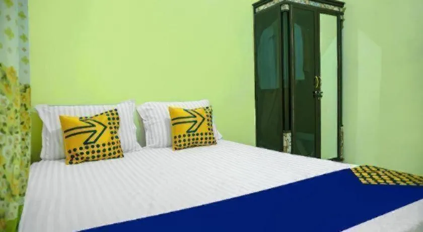 Bed in Hotel O Kost Qiu Qiu 99