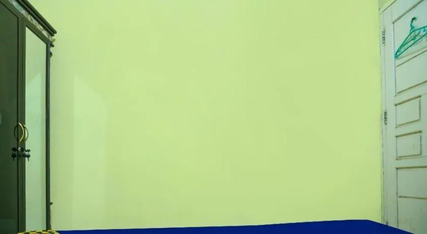 Bed in Hotel O Kost Qiu Qiu 99