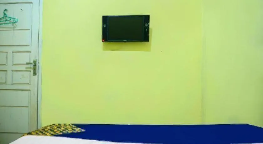 Bed in Hotel O Kost Qiu Qiu 99