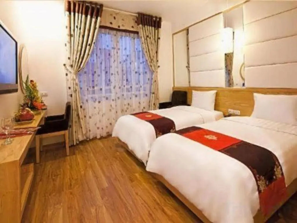 Bed in Tu Linh Palace Hotel