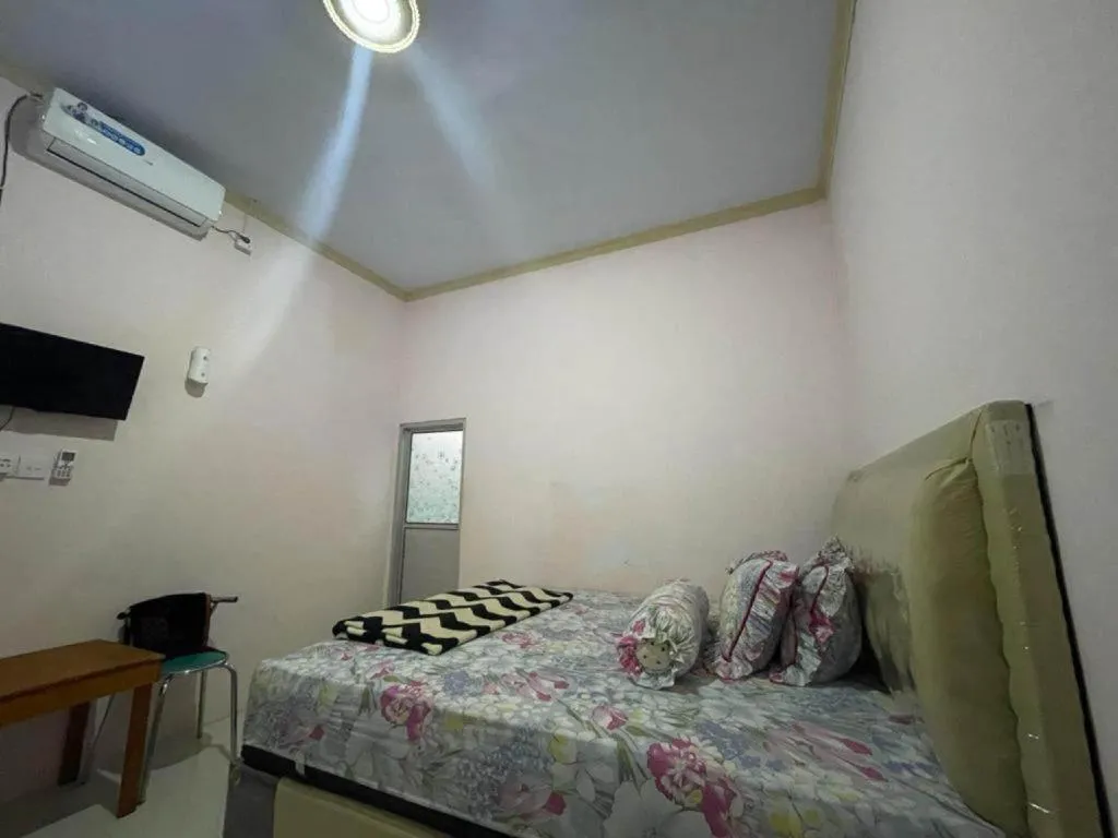 Bed in Hotel O Lima Saudara Syariah