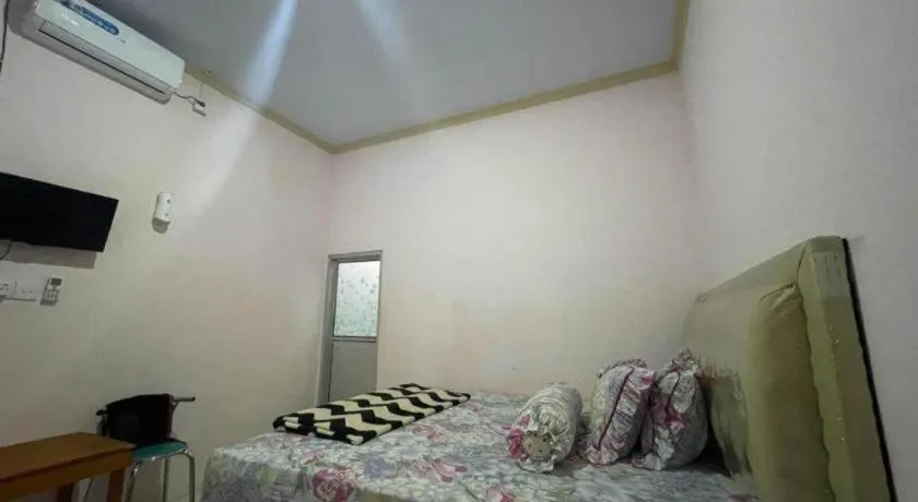 Bed in Hotel O Lima Saudara Syariah