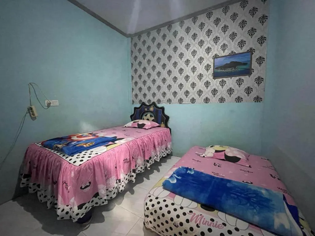 Bed in Hotel O Lima Saudara Syariah