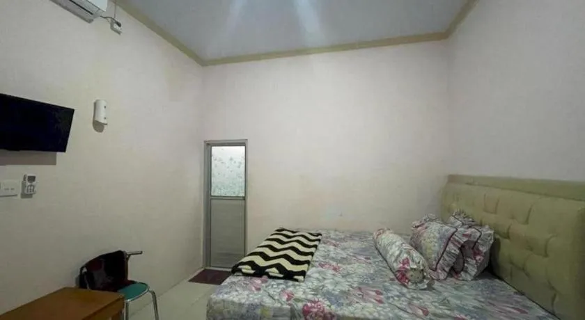 Bed in Hotel O Lima Saudara Syariah