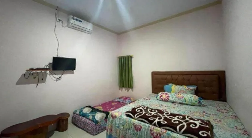 Bed in Hotel O Lima Saudara Syariah