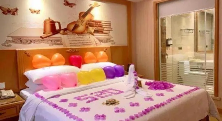 Bed in Vienna Hotel Shenzhen Bao'an Airport Taoyuanju Pingluanshan Metro Station