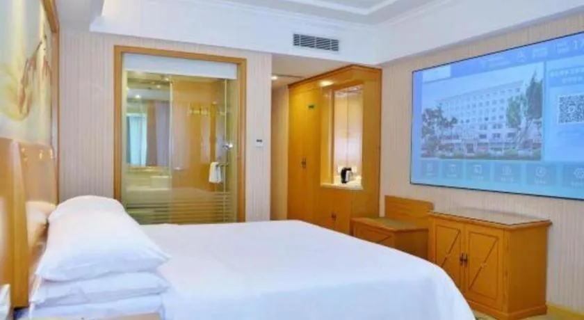 Bed in Vienna Hotel Shenzhen Bao'an Airport Taoyuanju Pingluanshan Metro Station