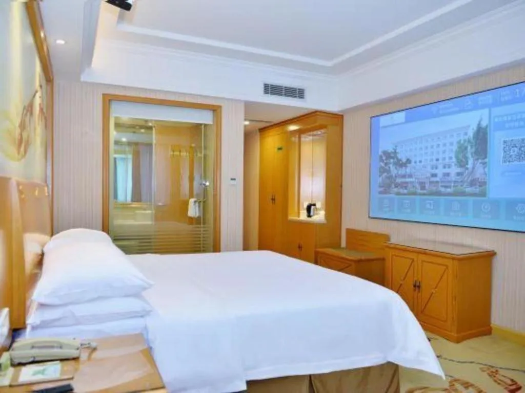 Bed in Vienna Hotel Shenzhen Bao'an Airport Taoyuanju Pingluanshan Metro Station