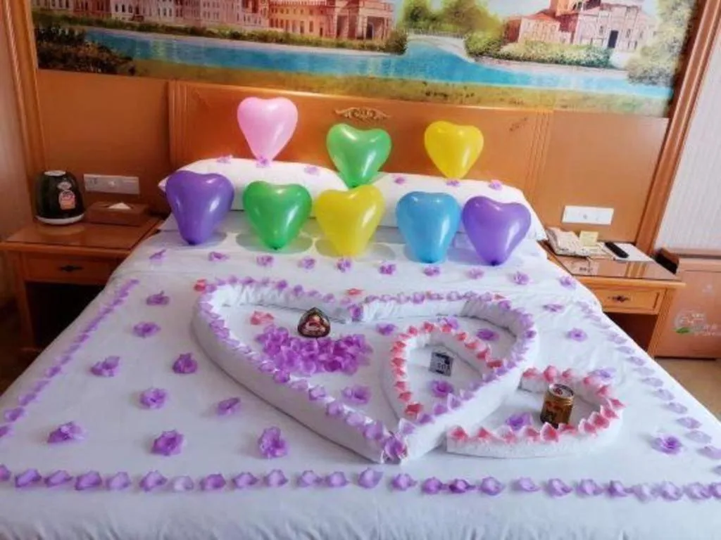 Bed in Vienna Hotel Shenzhen Bao'an Airport Taoyuanju Pingluanshan Metro Station