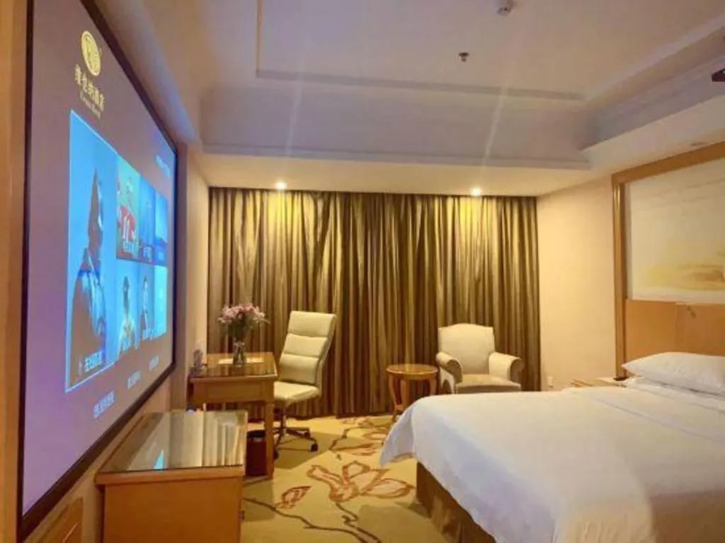 Bed in Vienna Hotel Shenzhen Bao'an Airport Taoyuanju Pingluanshan Metro Station