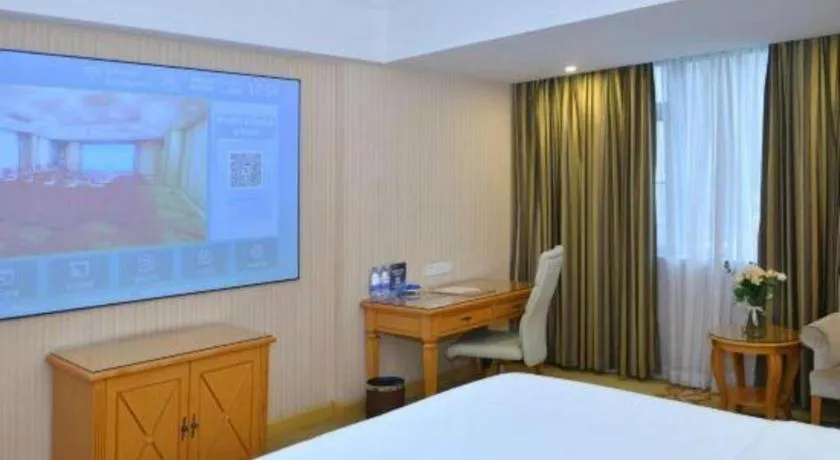 Bed in Vienna Hotel Shenzhen Bao'an Airport Taoyuanju Pingluanshan Metro Station