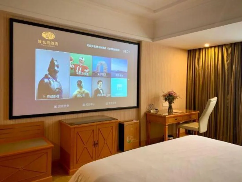 Bed in Vienna Hotel Shenzhen Bao'an Airport Taoyuanju Pingluanshan Metro Station