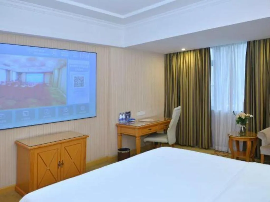 Bed in Vienna Hotel Shenzhen Bao'an Airport Taoyuanju Pingluanshan Metro Station