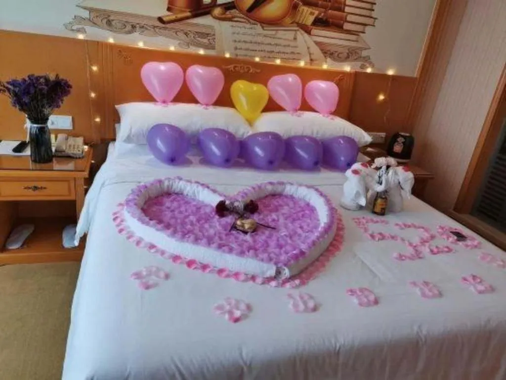 Bed in Vienna Hotel Shenzhen Bao'an Airport Taoyuanju Pingluanshan Metro Station