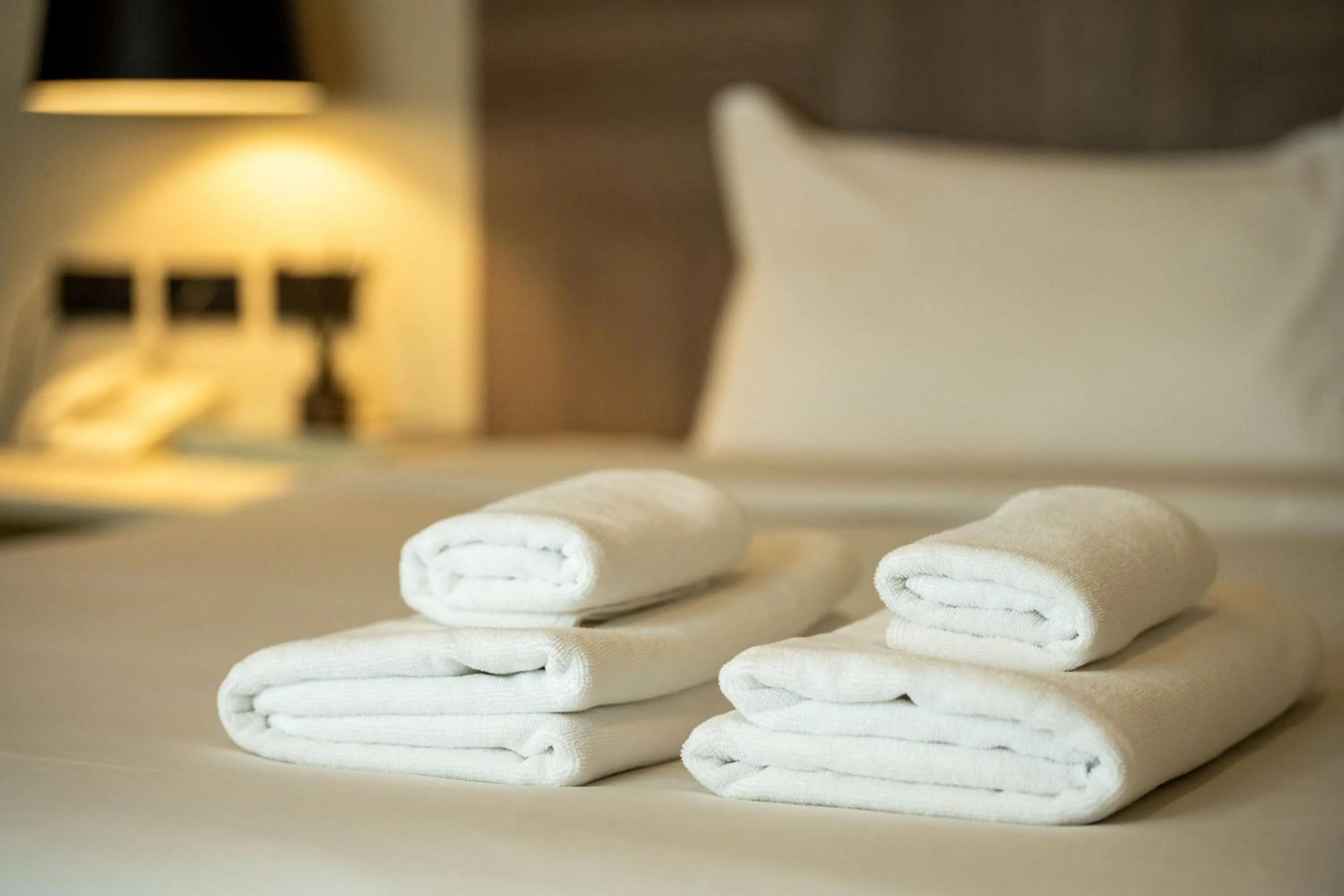towels, Bed in Ralph Poshtel Pratunam