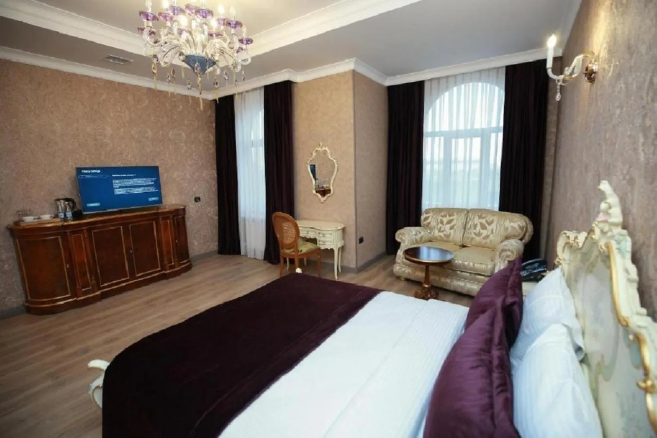 Bed in West Inn Hotel & Restaurant