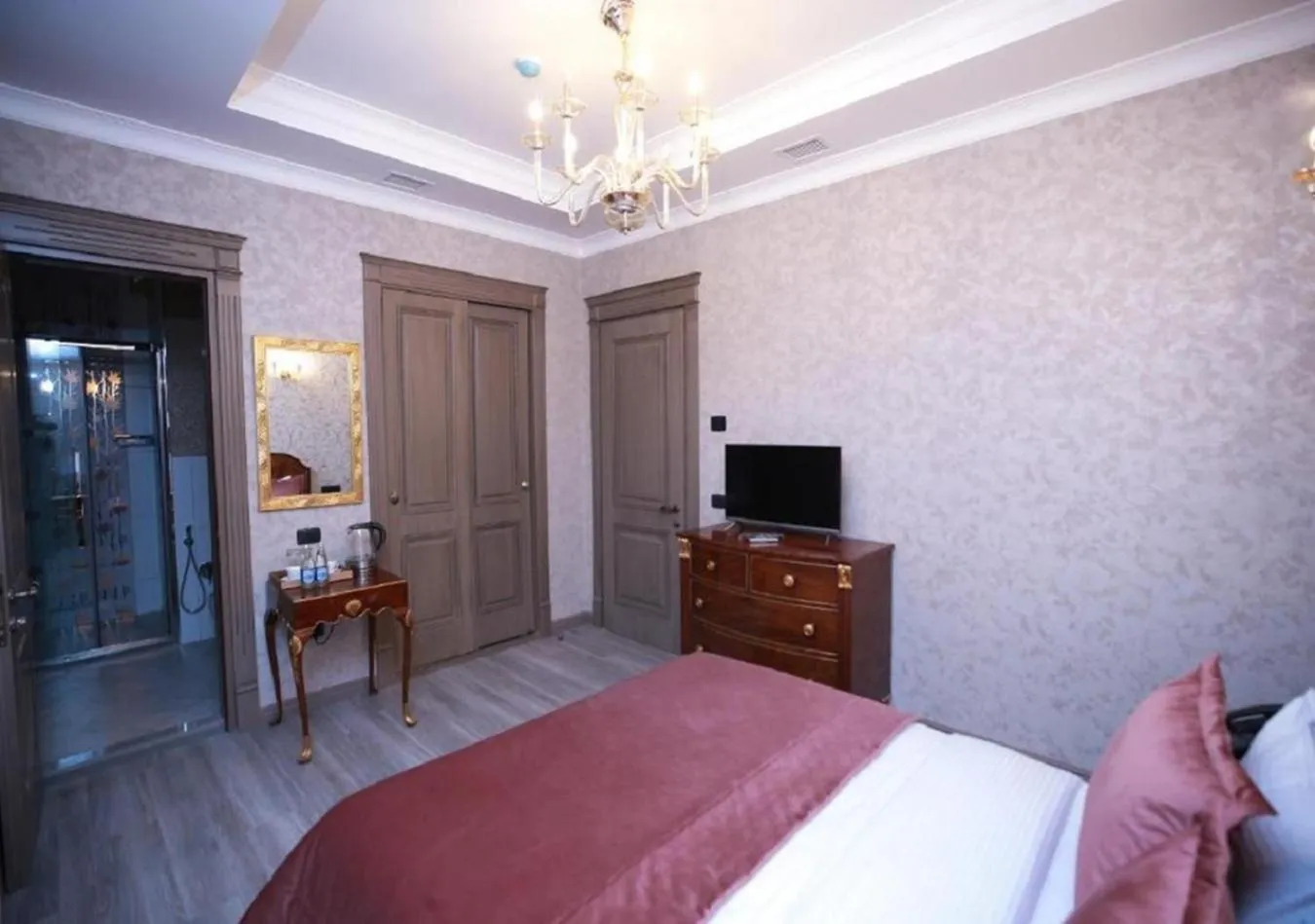 Bed in West Inn Hotel & Restaurant