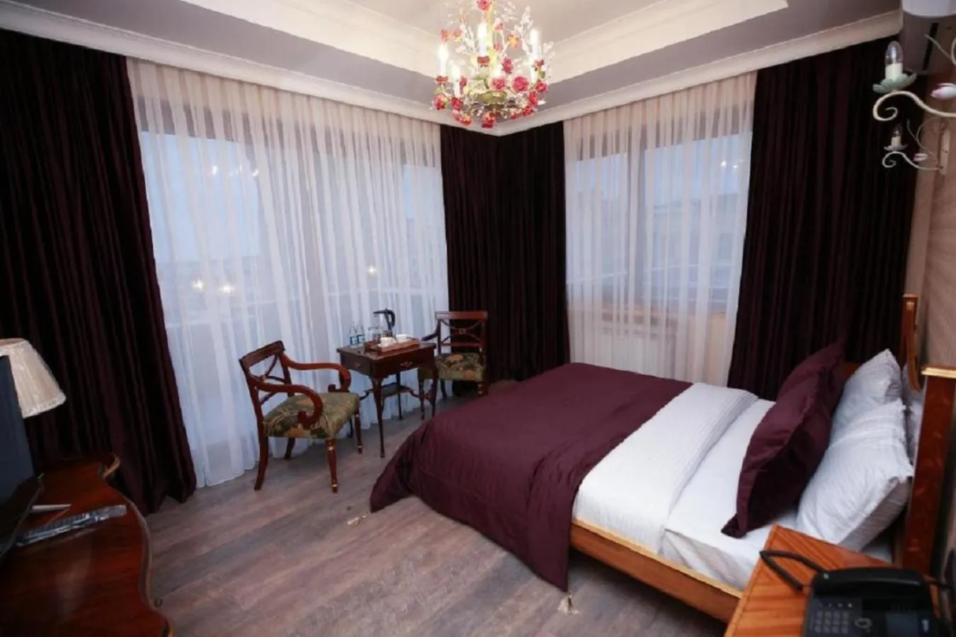Bed in West Inn Hotel & Restaurant