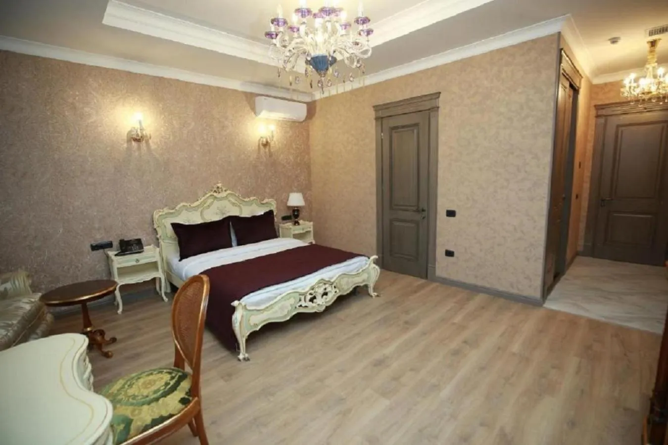 Bed in West Inn Hotel & Restaurant