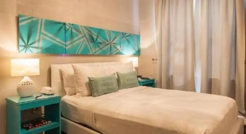 Bed in Odyssey of South Beach Apart Hotel