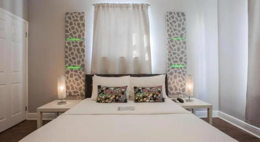 Bed in Odyssey of South Beach Apart Hotel