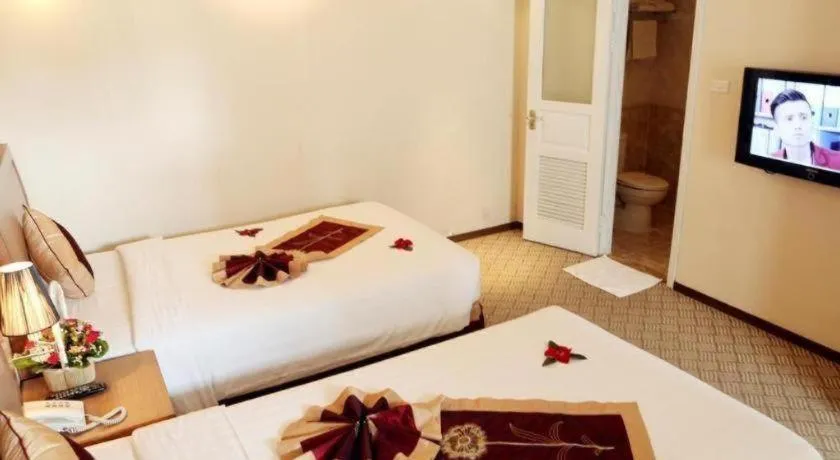 Bed in Lenid De Ho Guom Hotel