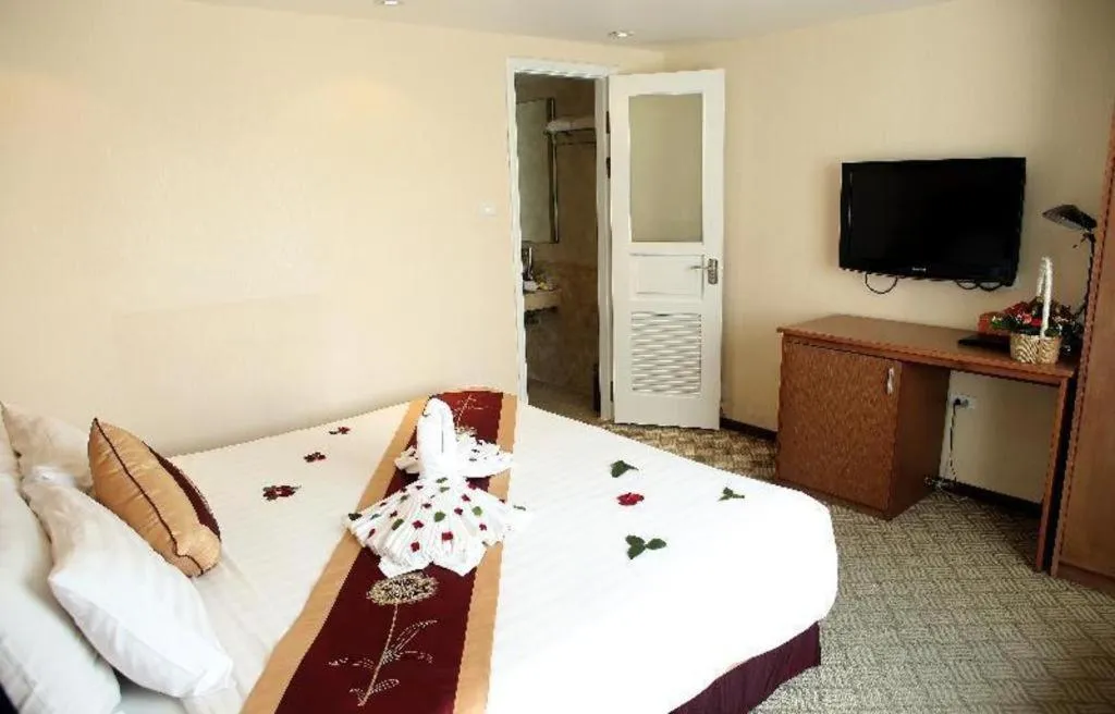 Bed in Lenid De Ho Guom Hotel