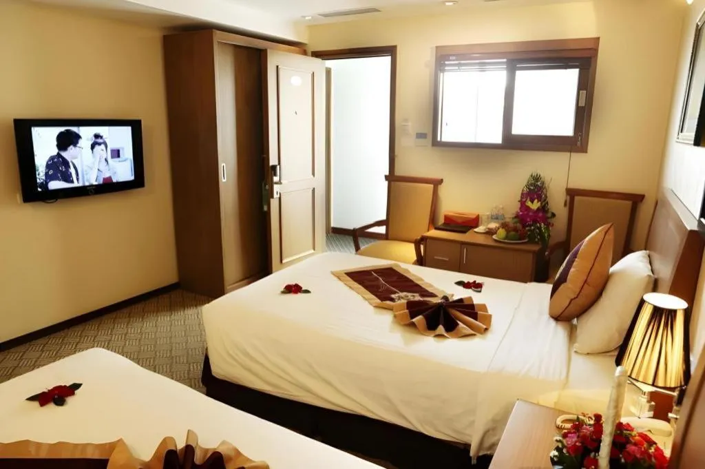 Bed in Lenid De Ho Guom Hotel