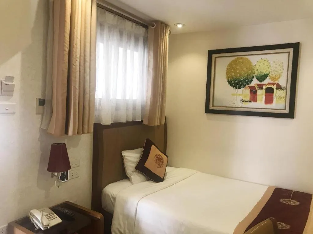 Bed in Lenid De Ho Guom Hotel