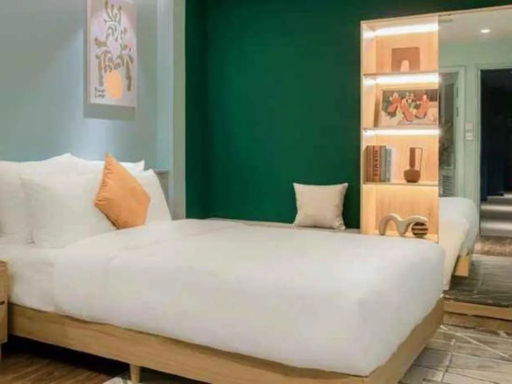 Bed in Lenid De Ho Guom Hotel